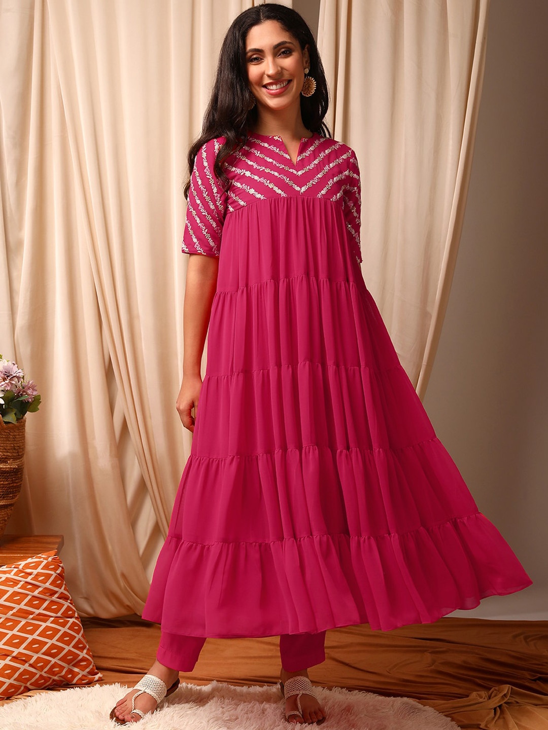 

Inddus Pink Ethnic Motifs Embroidered Tiered Thread Work A-Line Kurta With Trouser