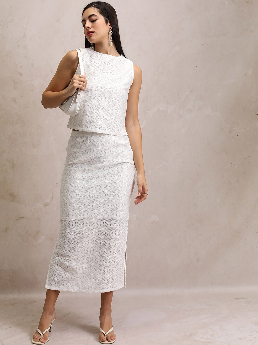 

Tokyo Talkies White Self Design Round Neck Crochet Top With Pencil Skirt