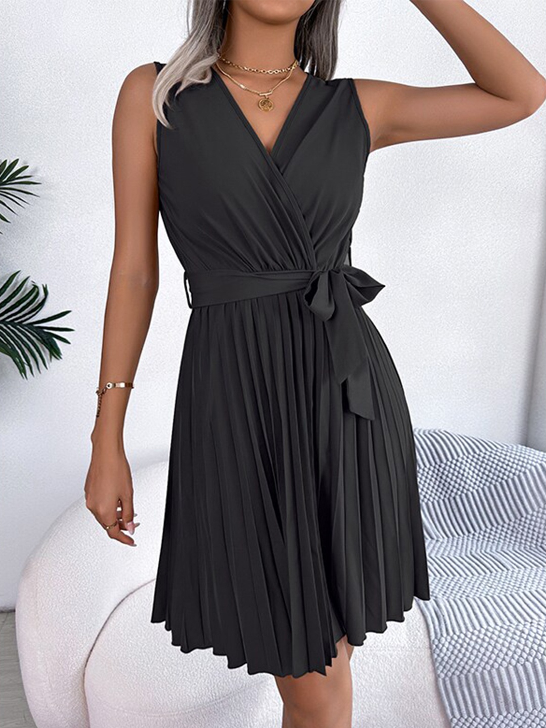 

StyleCast x Revolte Black V-Neck Sleeveless Midi Wrap Dress