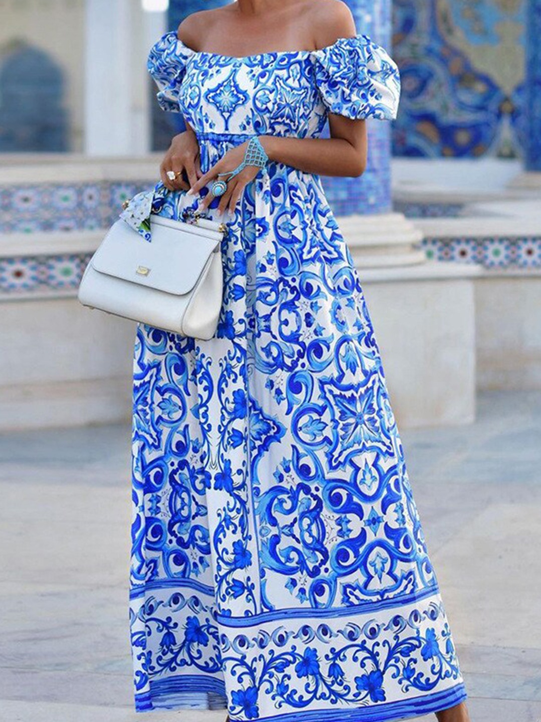 

StyleCast x Revolte Blue Floral Printed Off-Shoulder Puff Sleeves Fit and Flare Maxi Dress