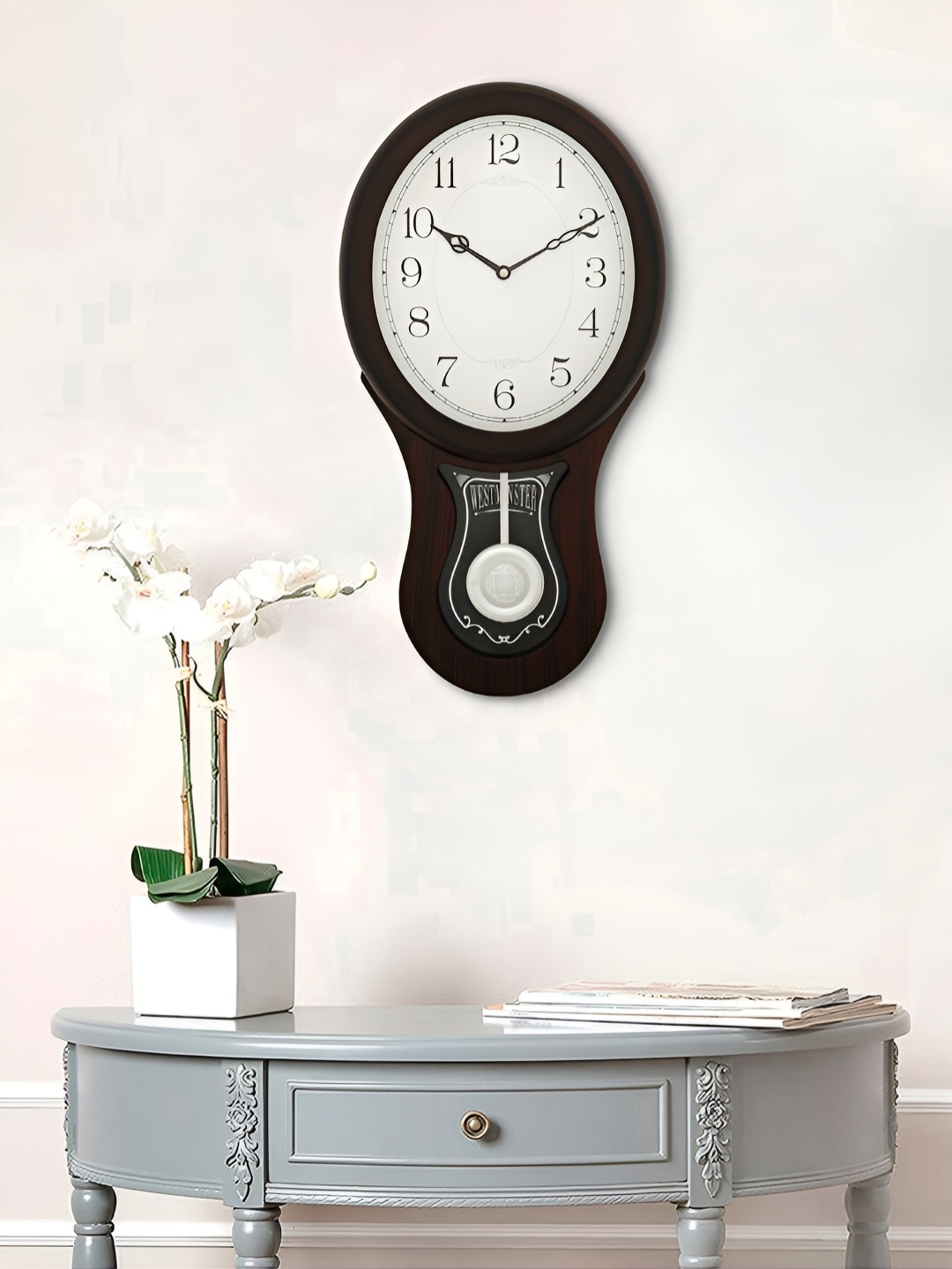 

Craft Smith Brown Abstract Shaped Wooden Traditional Wall Clock
