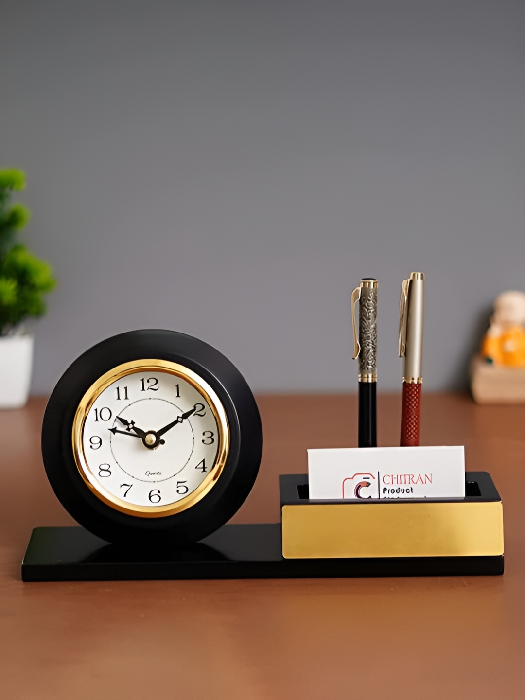 

Craft Smith Black Embellished Round Wooden Traditional Table Clock
