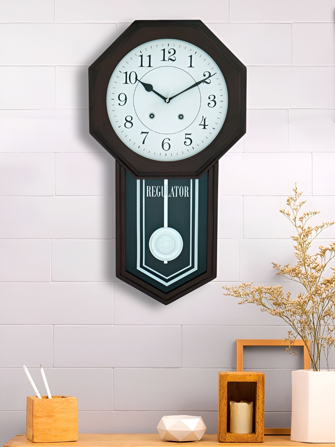 

Craft Smith Brown Geometric Analogue Contemporary Pendulum Wall Clock