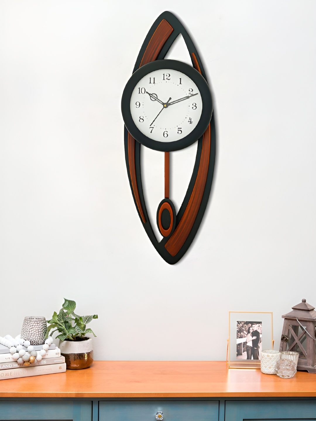 

Craft Smith Brown Round Shaped Contemporary Pendulum Wall Clock, Black
