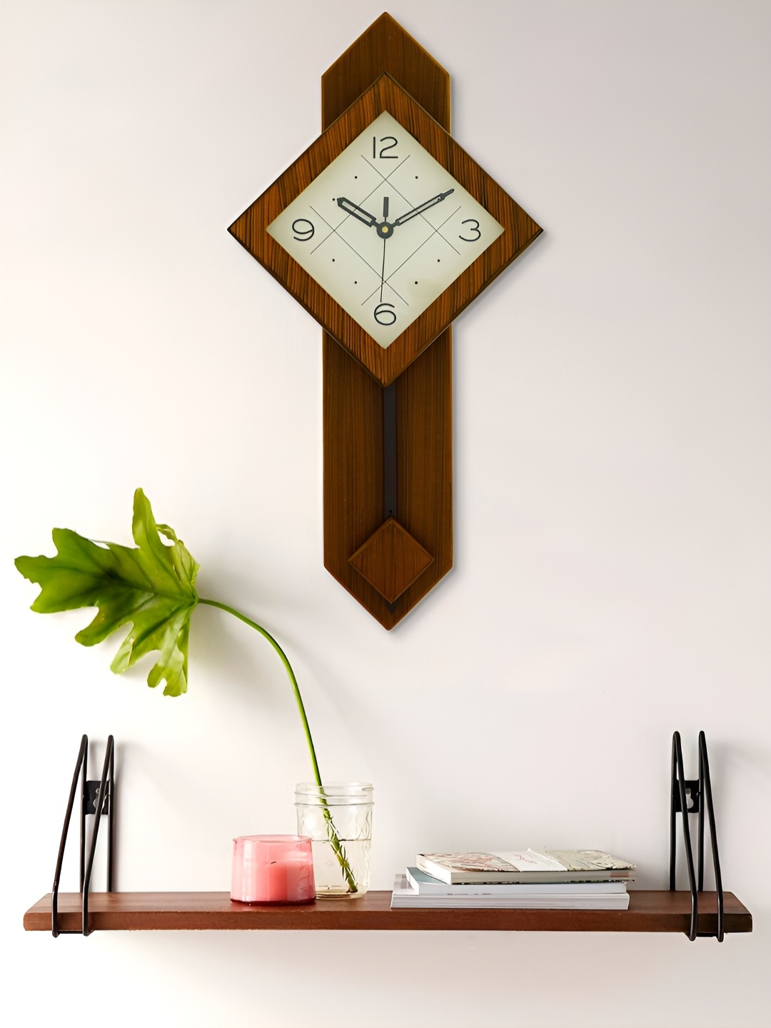 

Craft Smith Brown Embellished Abstract Shaped Contemporary Pendulum Wall Clock