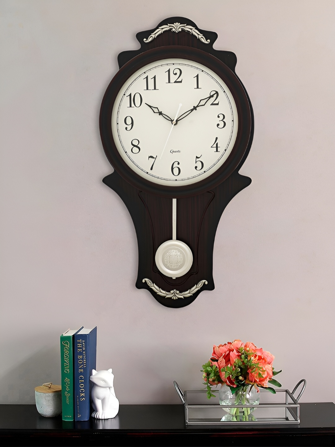 

Craft Smith Brown Round Shaped Contemporary Pendulum Wall Clock