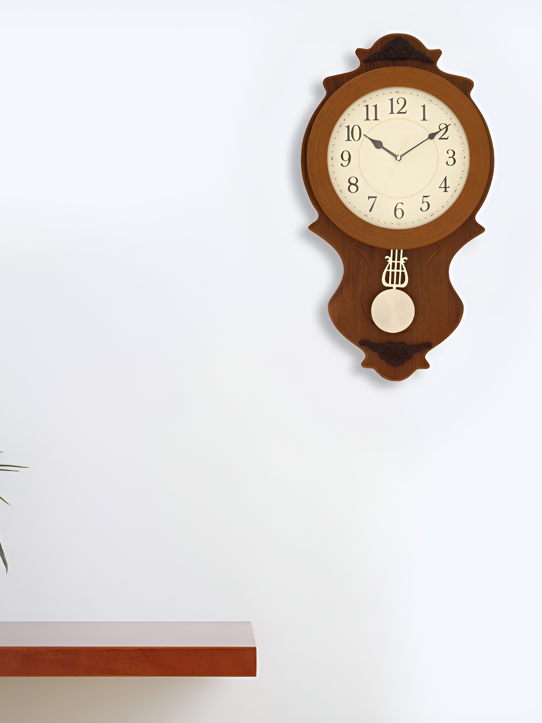 

Craft Smith Brown Round Shaped Contemporary Pendulum Wall Clock