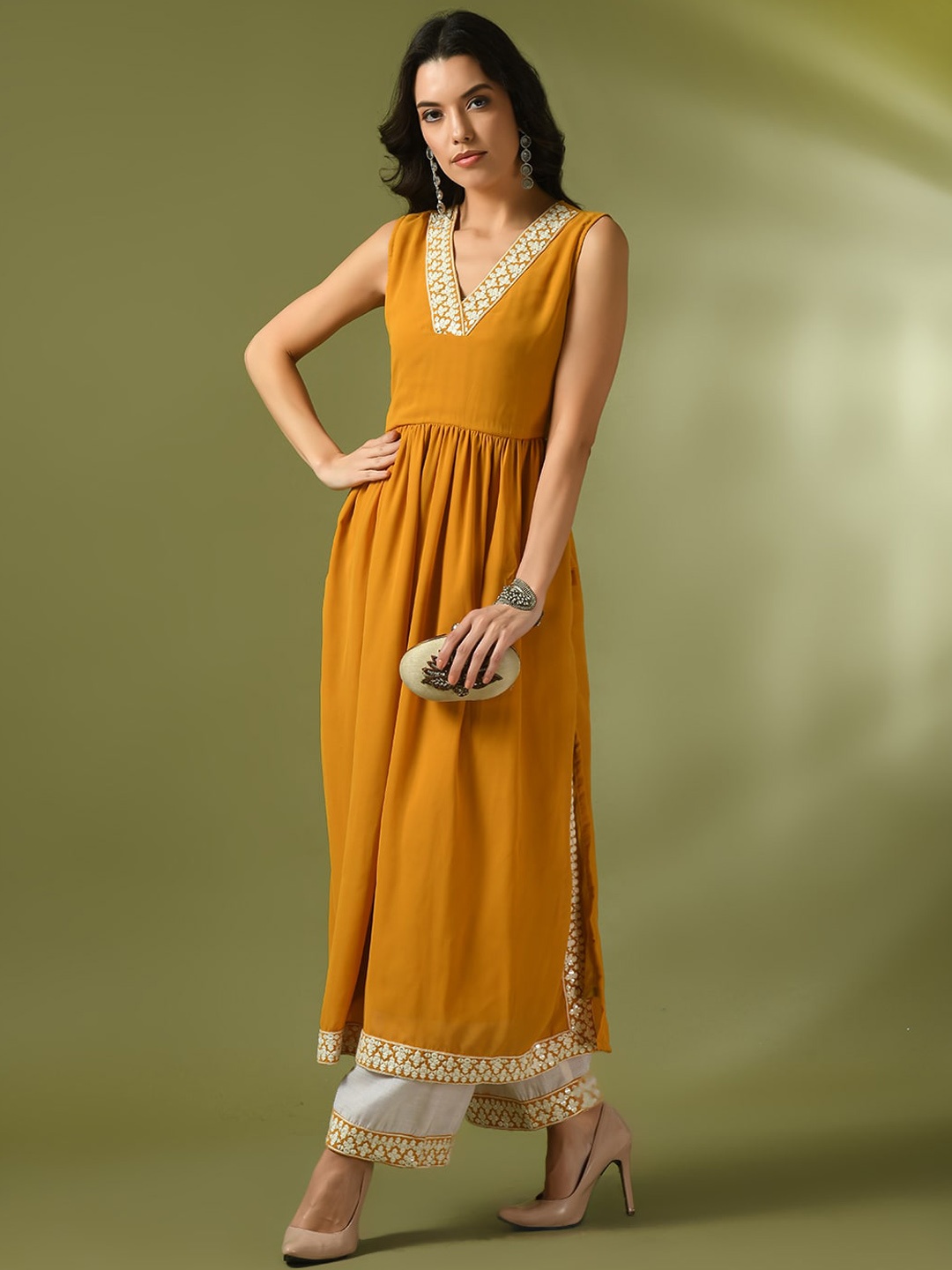 

Sangria Thread Work Sleeveless V-Neck A-Line Georgette Kurta & Palazzos, Mustard