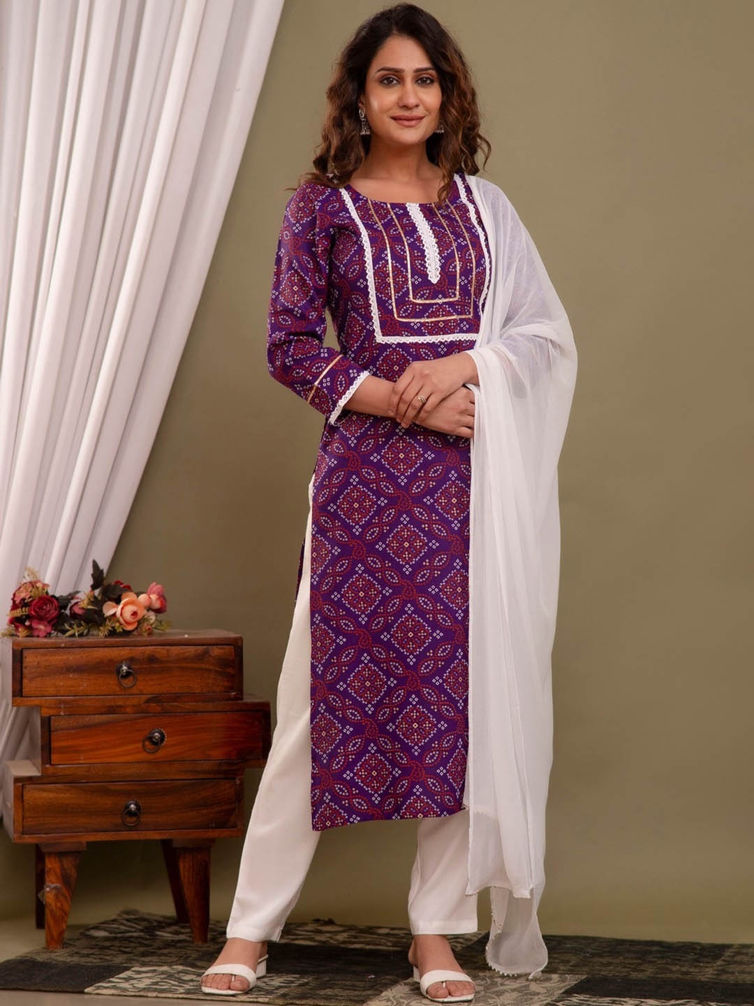 

PURVIJA KURTIES Bandhani Printed Regular Gotta Patti Straight Kurta With Trouser & Dupatta, Violet