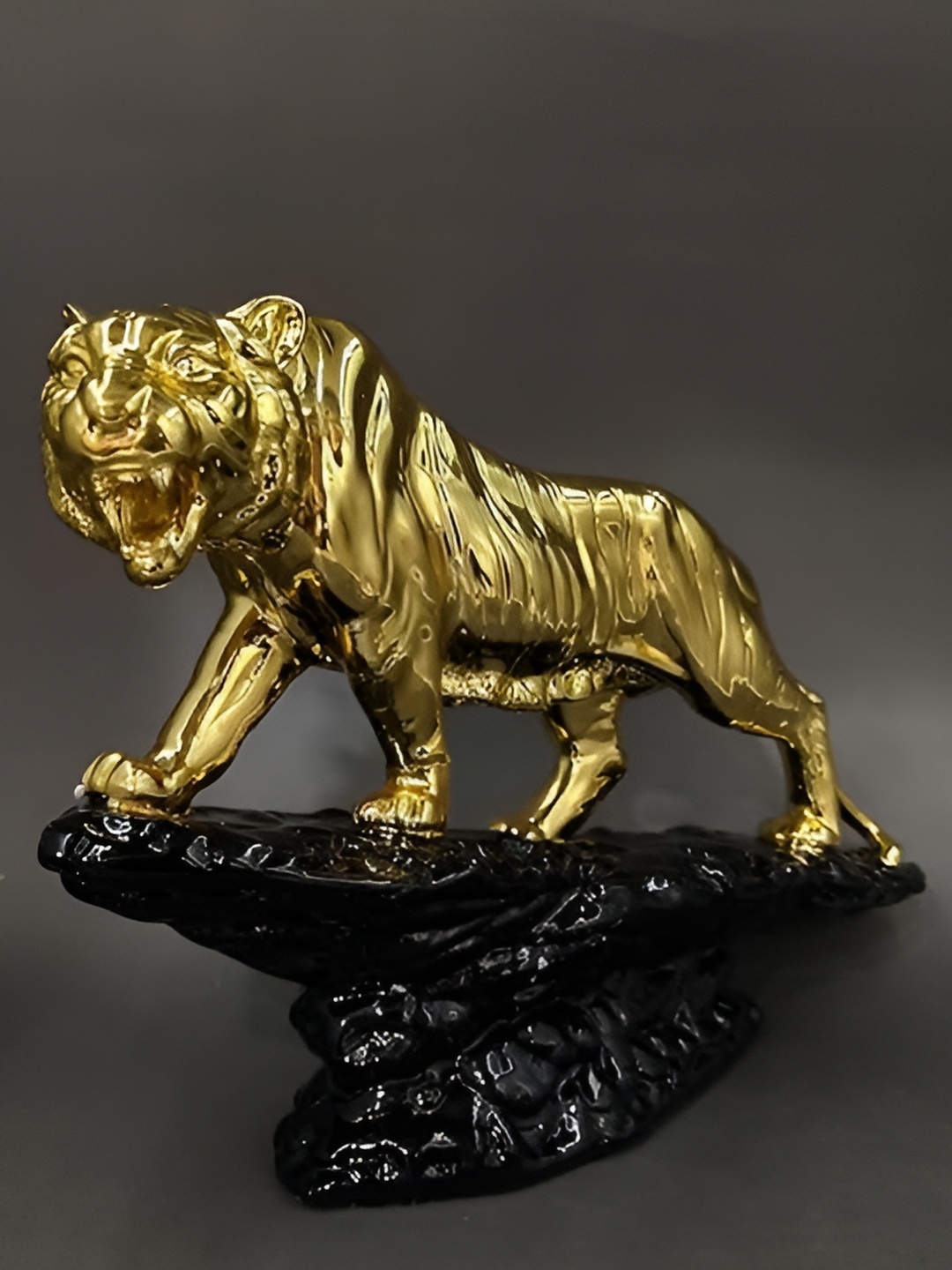 

CraftVatika Gold-Toned Tiger Statue Idol Showpiece