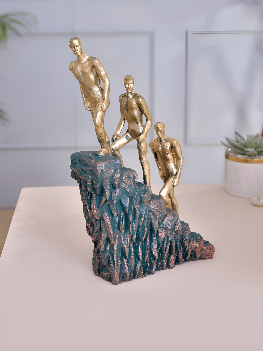 

CraftVatika Gold-Toned Abstract Idol Showpiece
