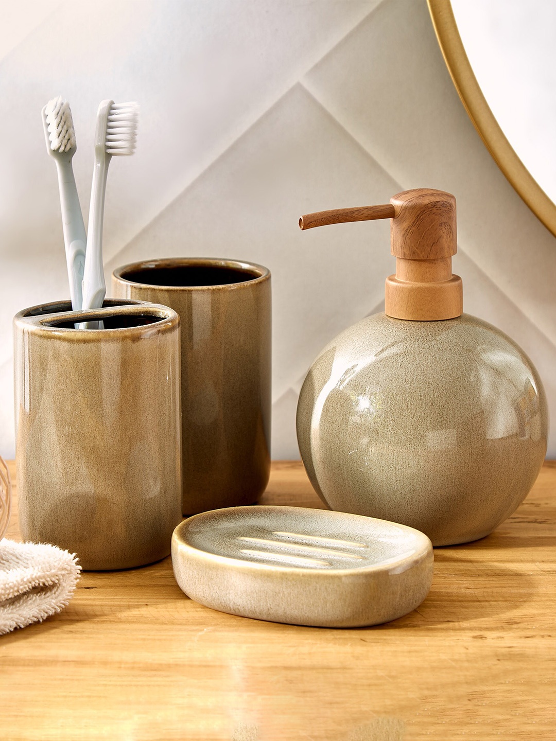 

Home Centre Noelle Reactive Green Ceramic Tooth Brush Holder