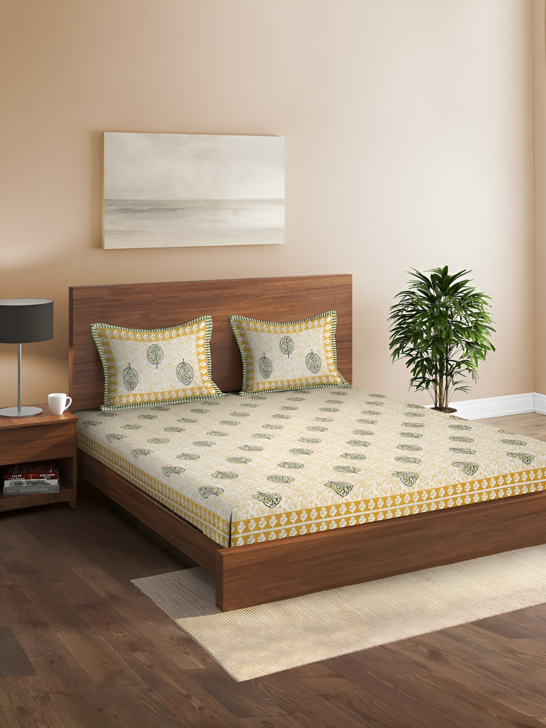 

Rajasthan Decor White & Yellow Floral Cotton 180 TC Queen Bedsheet with 2 Pillow Covers