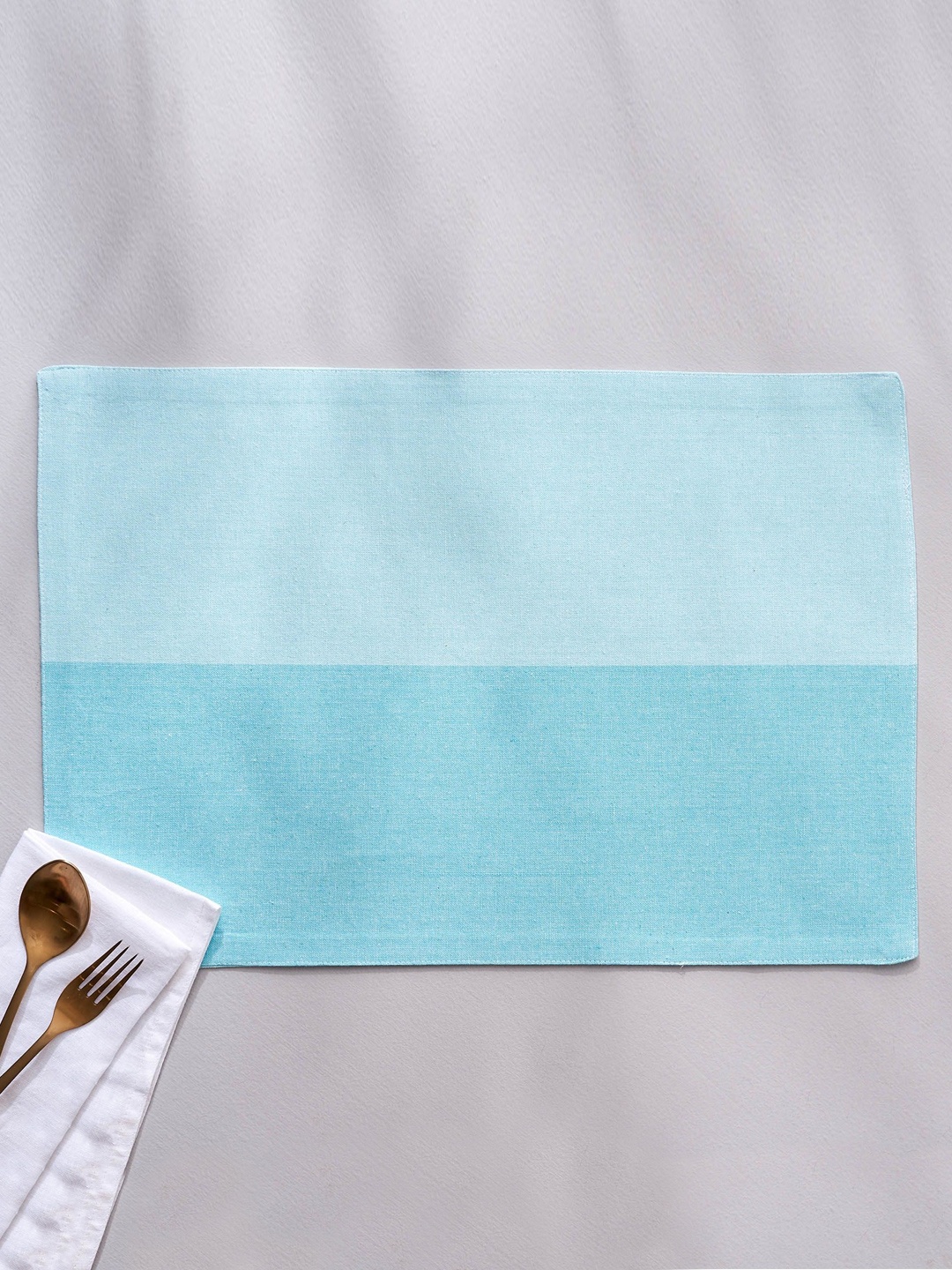 

Home Centre Colour Refresh Blue Cotton Woven Design Reversible Table Placemat