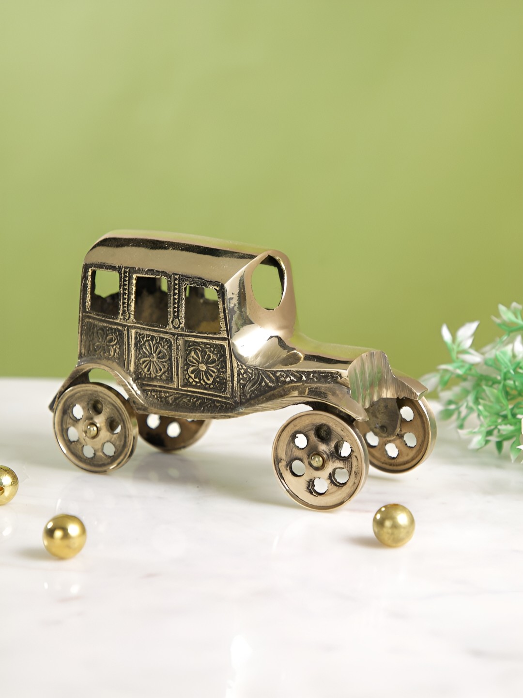 

CraftVatika Gold-Toned Medium Curio Showpiece