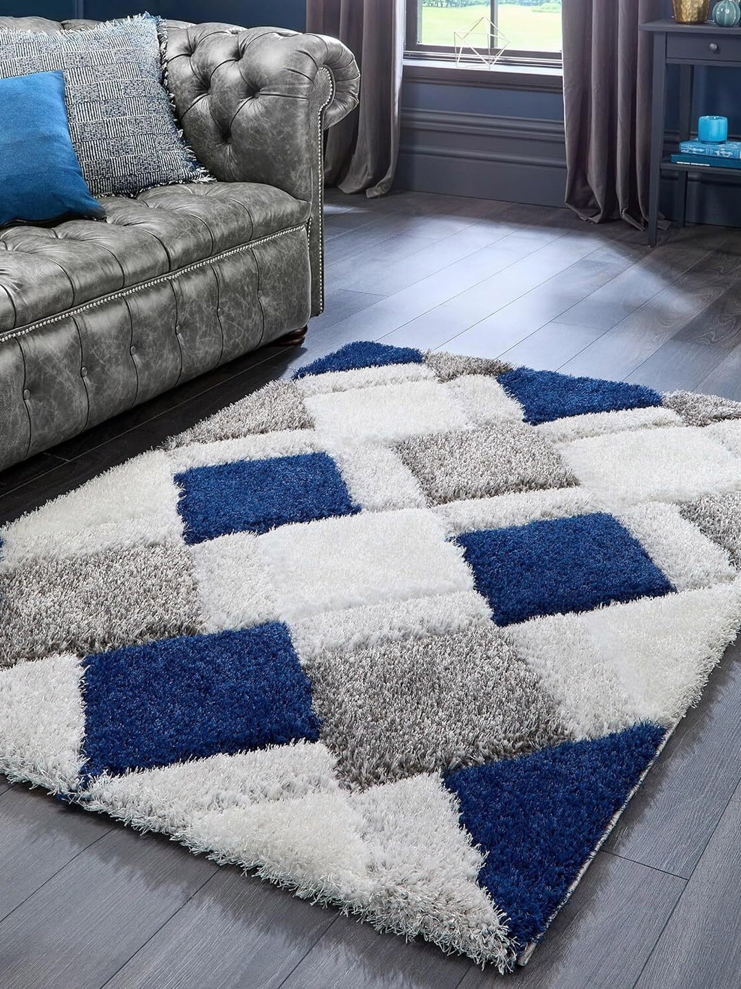 

SR Handloom Blue & White Geometric Shaggy Carpet