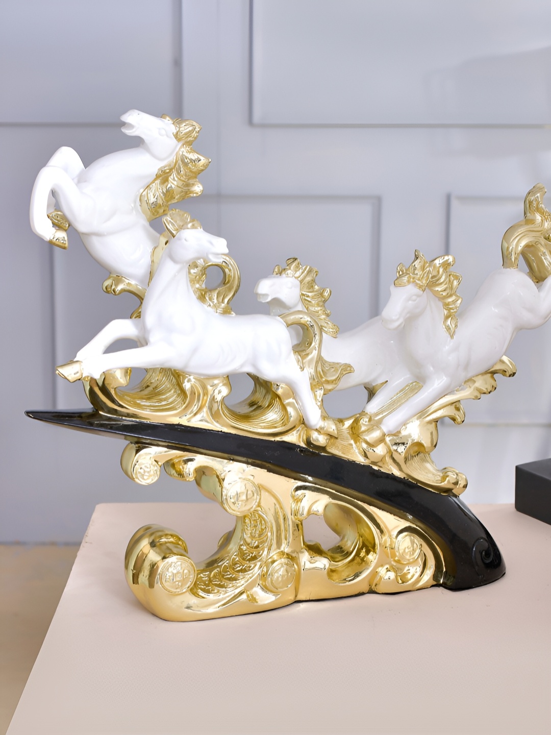 

CraftVatika White & Gold toned Idol Showpiece