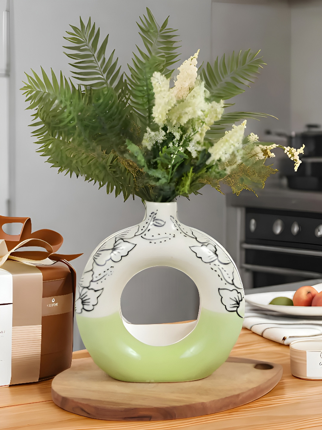 

Kaolinite Lime Green & White Floral Pattern Donut Shaped Ceramic Flower Vase