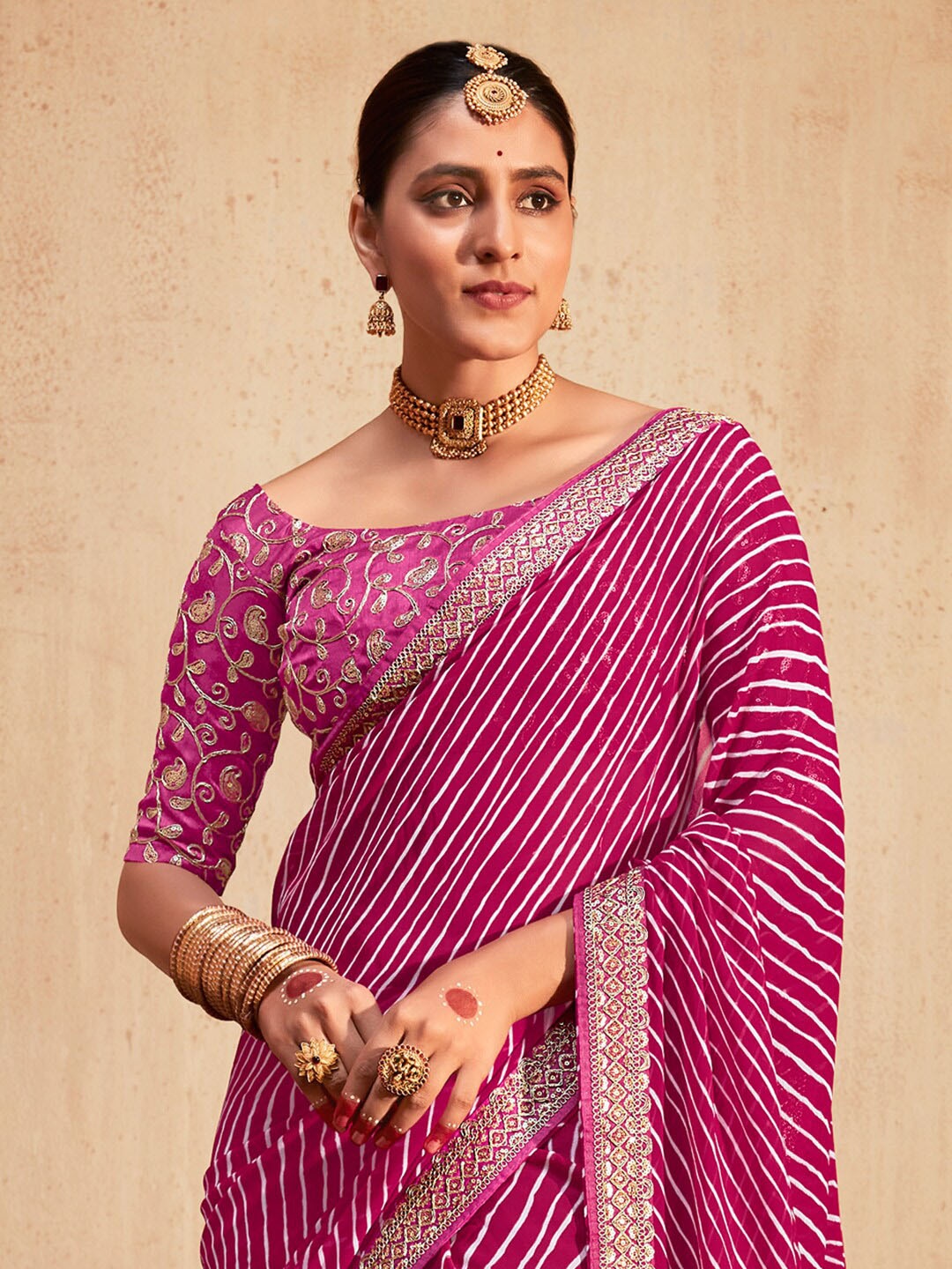 

KALINI Striped Embroidered Pure Georgette Leheriya Saree, Magenta