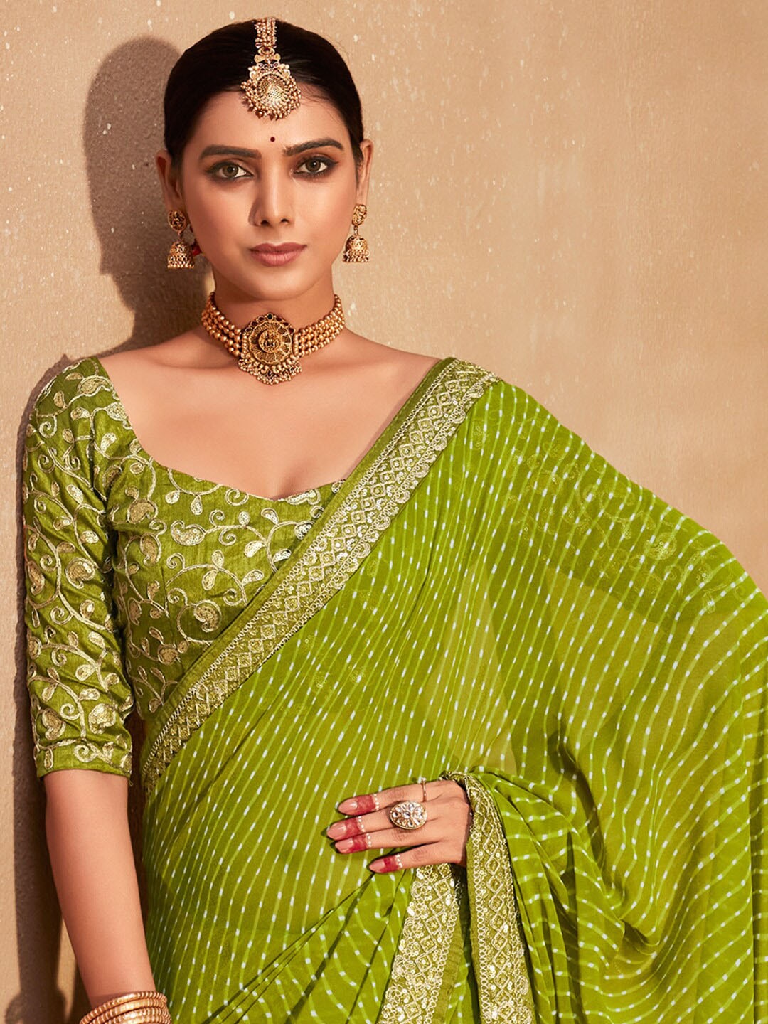 

KALINI Striped Embroidered Pure Georgette Leheriya Saree, Green