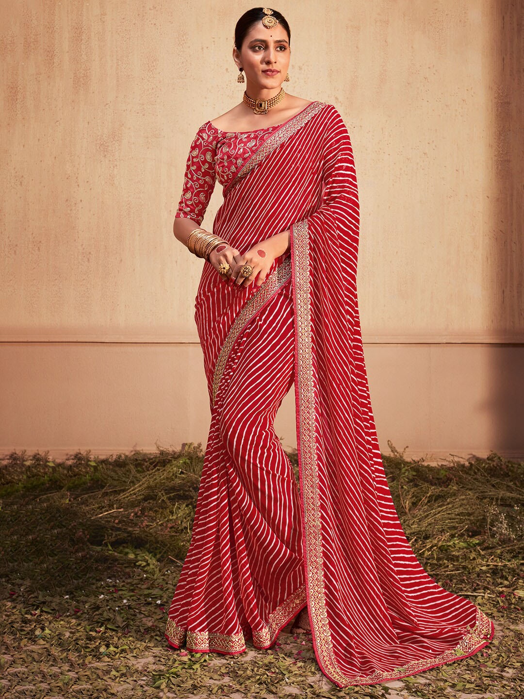 

KALINI Striped Embroidered Poly Georgette Leheriya Saree, Red