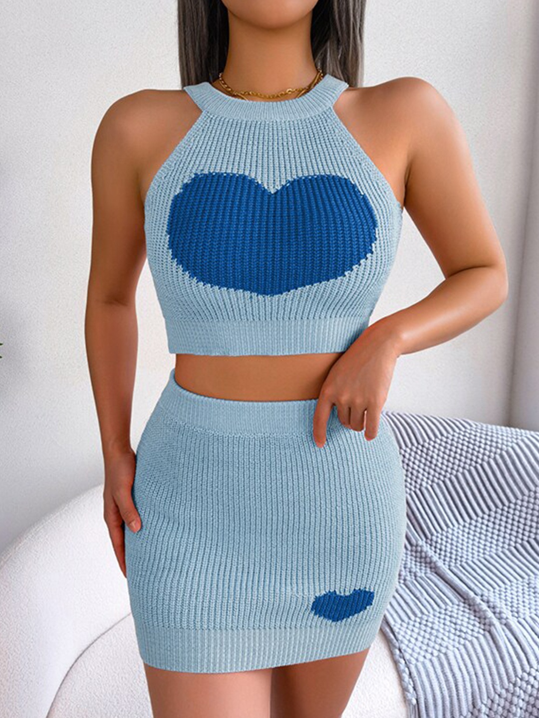

StyleCast x Revolte Blue Knitted Heart Design Top and MIni Skirt Co-ords