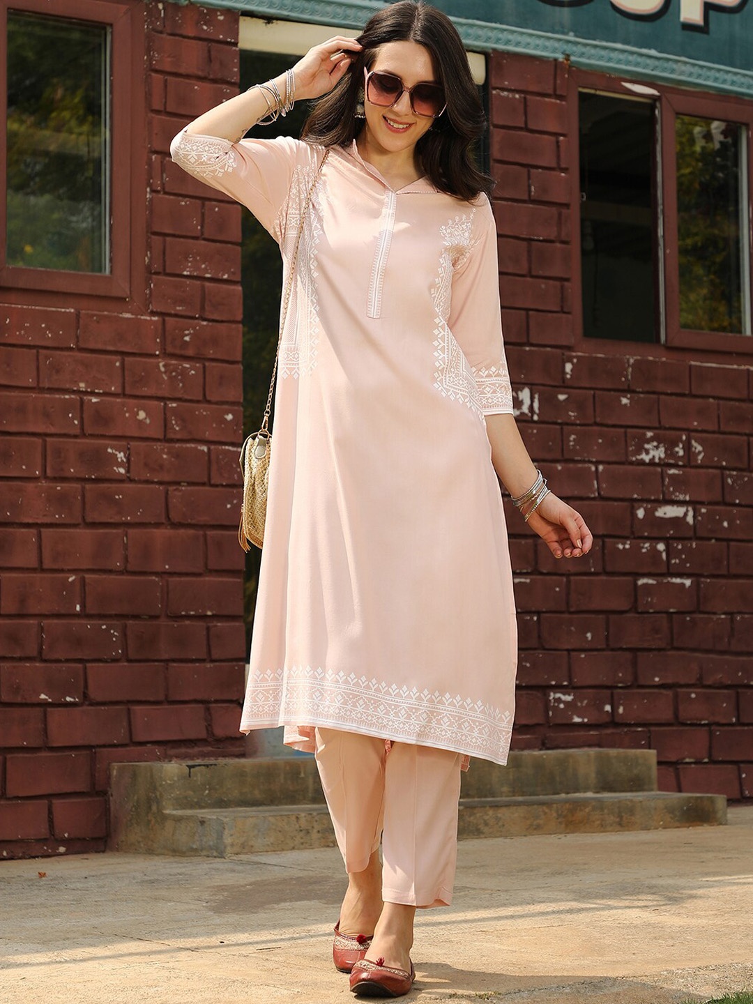 

QISSA Ethnic Motifs Printed Regular Kurta with Trousers, Orange
