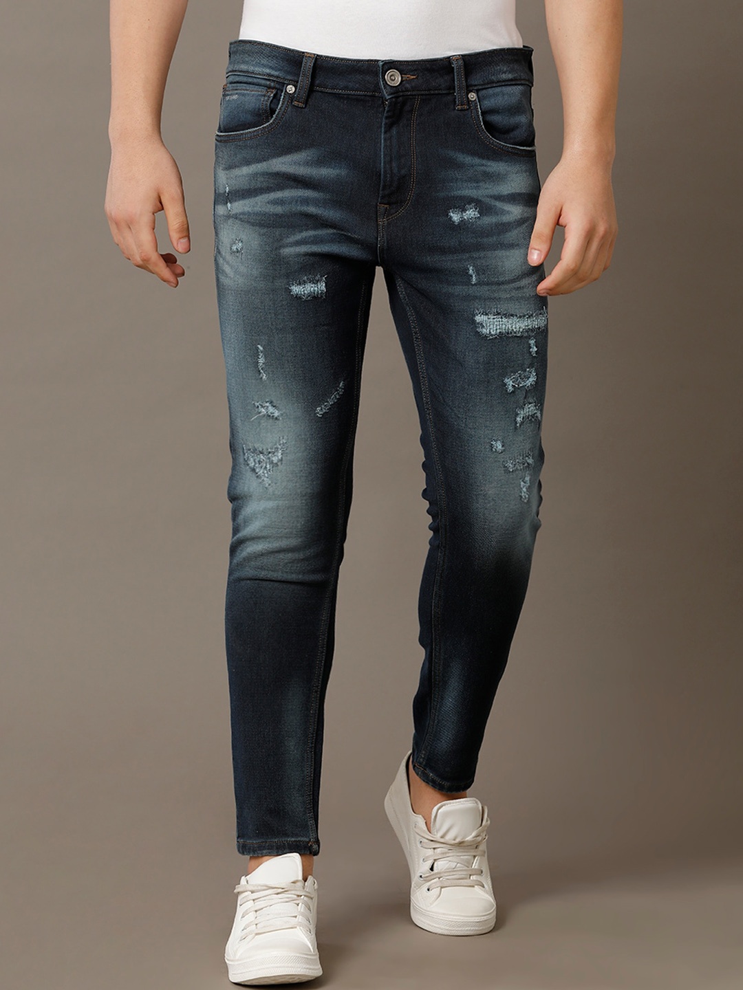 

Voi Jeans Men Comfort Skinny Fit Mildly Distressed Light Fade Whiskers Stretchable Jeans, Blue