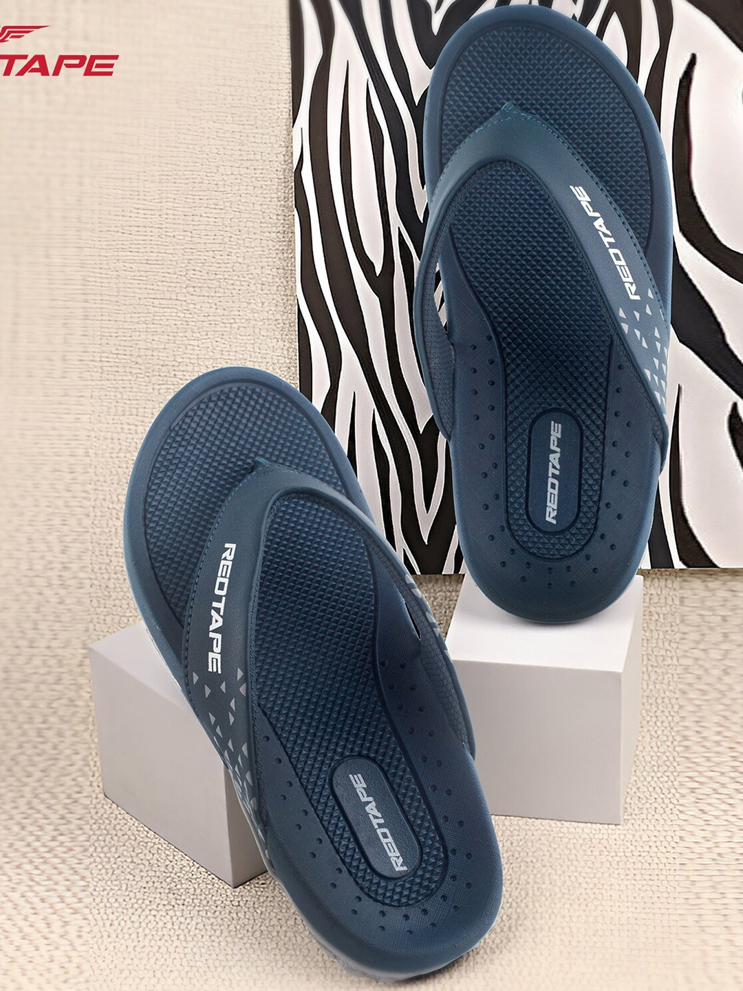 

Red Tape Men Printed Thong Flip-Flops, Navy blue