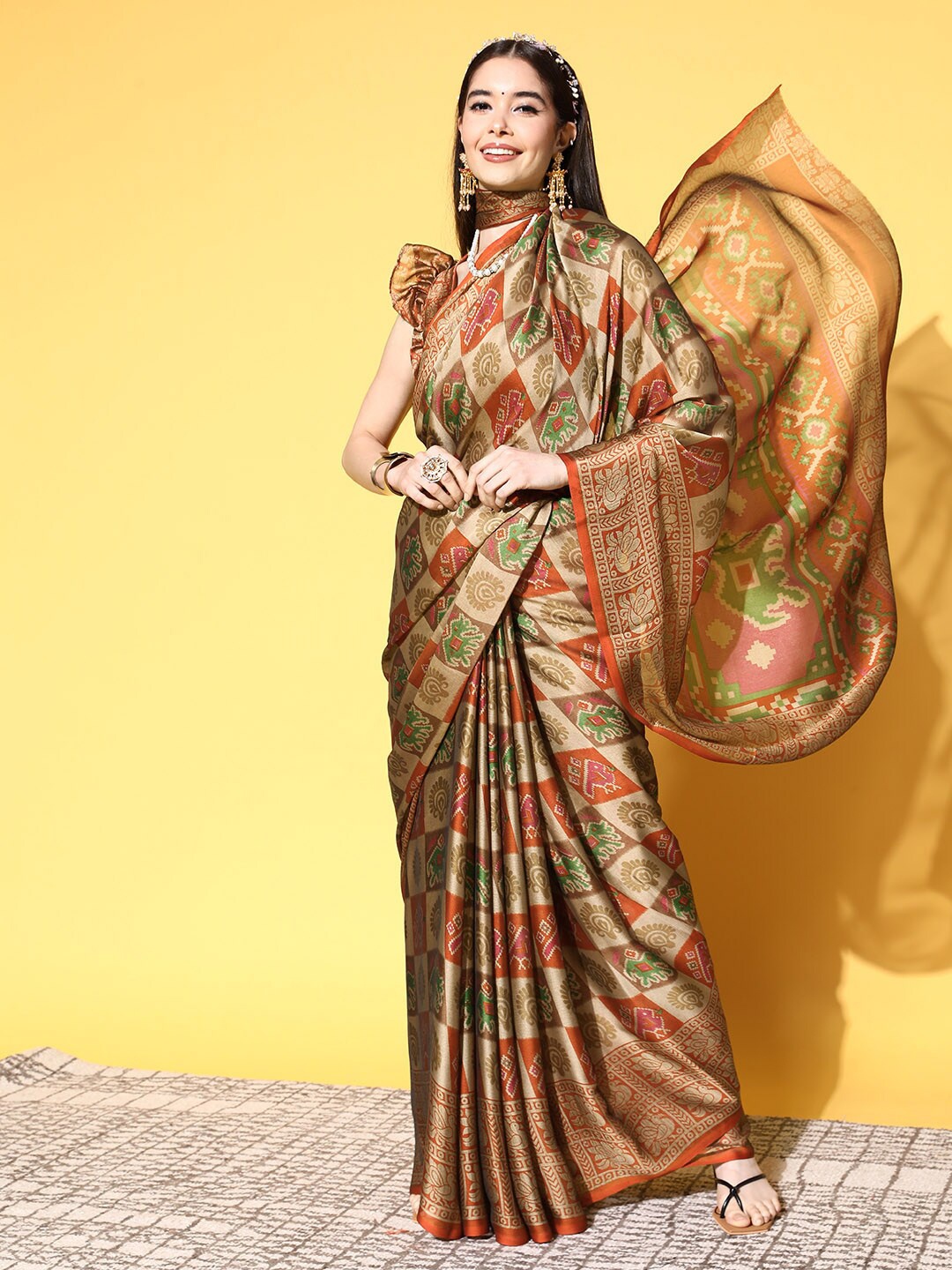 

Mitera Brown Ethnic Motifs Printed Saree