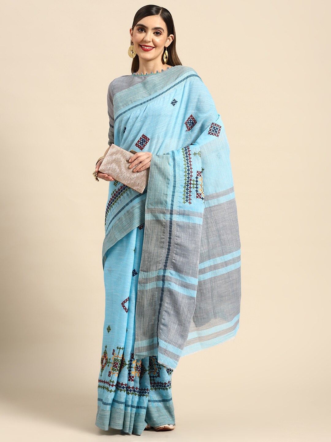 

Mitera Blue Floral Embroidered Pure Linen Saree, Turquoise blue