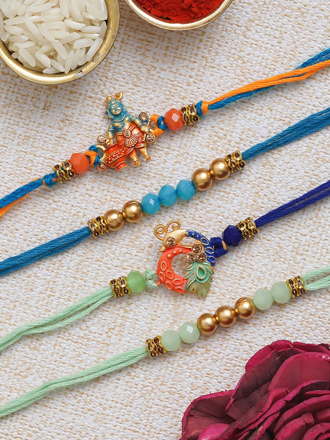 

eCraftIndia Unisex Set Of 4 Lord Krishna Peacock & Beaded Rakhis With Roli & Chawal, Gold