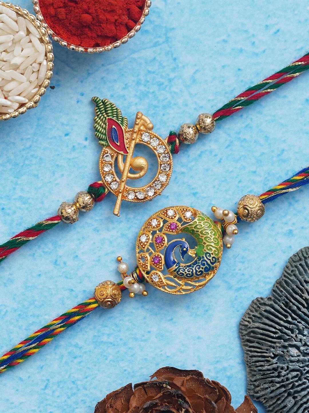 

eCraftIndia Set of 2 Peacock Flute Designer Embellished Rakhis With Roli Chawal, Gold