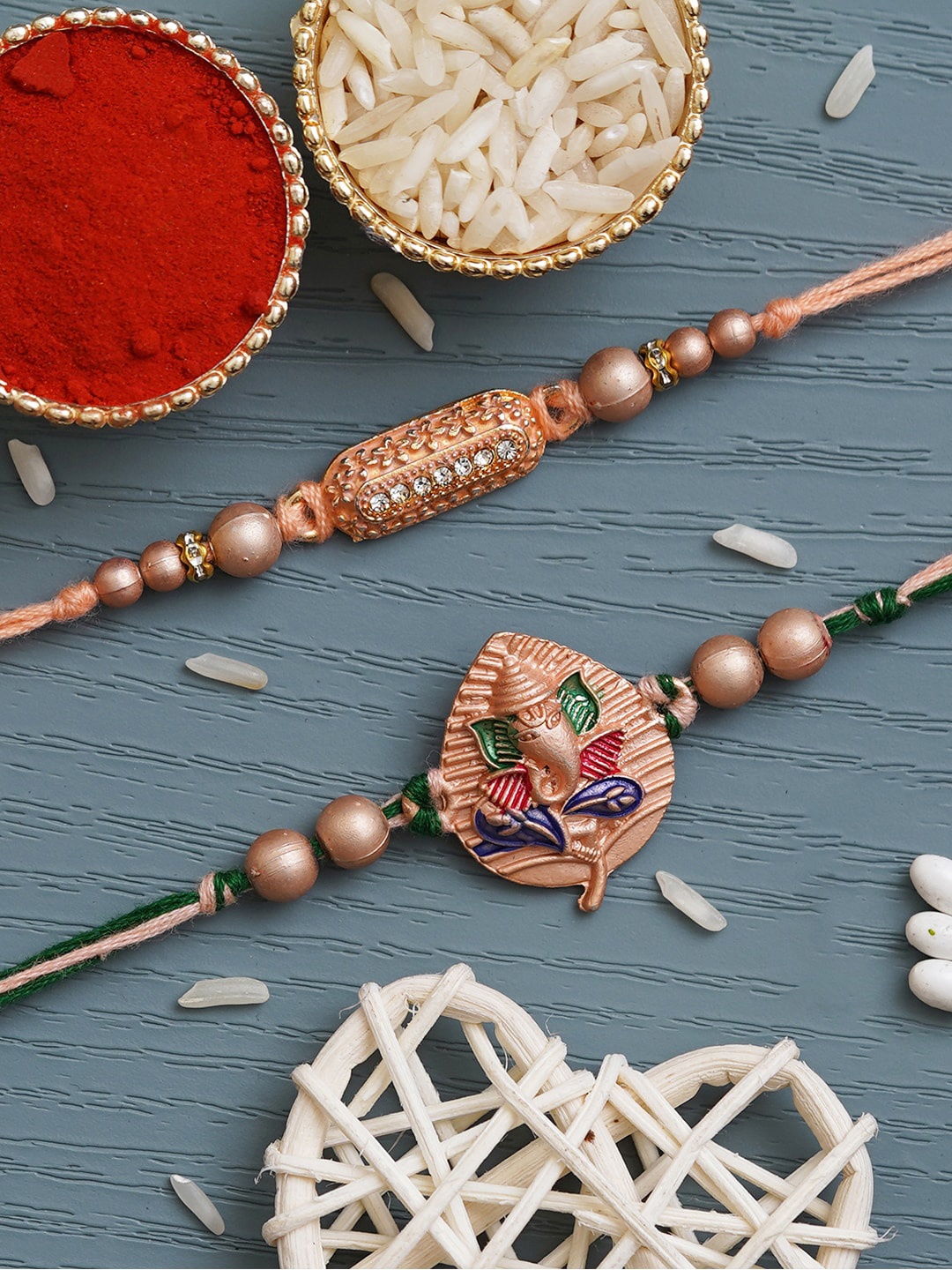 

eCraftIndia Set Of 2 Lord Ganesha & Rectangle Shaped Rakhis With Roli & Chawal, Gold