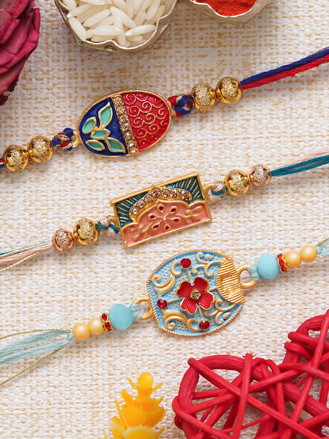 

eCraftIndia Unisex Set Of 3 Enamelled Rakhis With Roli & Chawal, Gold