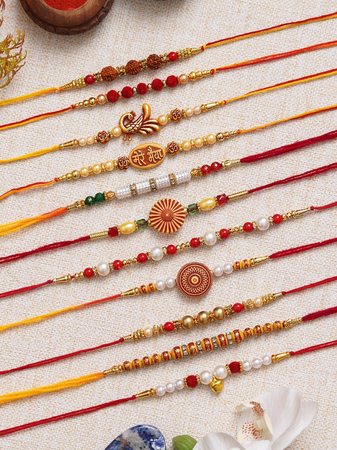 

eCraftIndia Set of 11 Rudraksha Peacock Mere Bhaiya Flower Bead Rakhis, Red