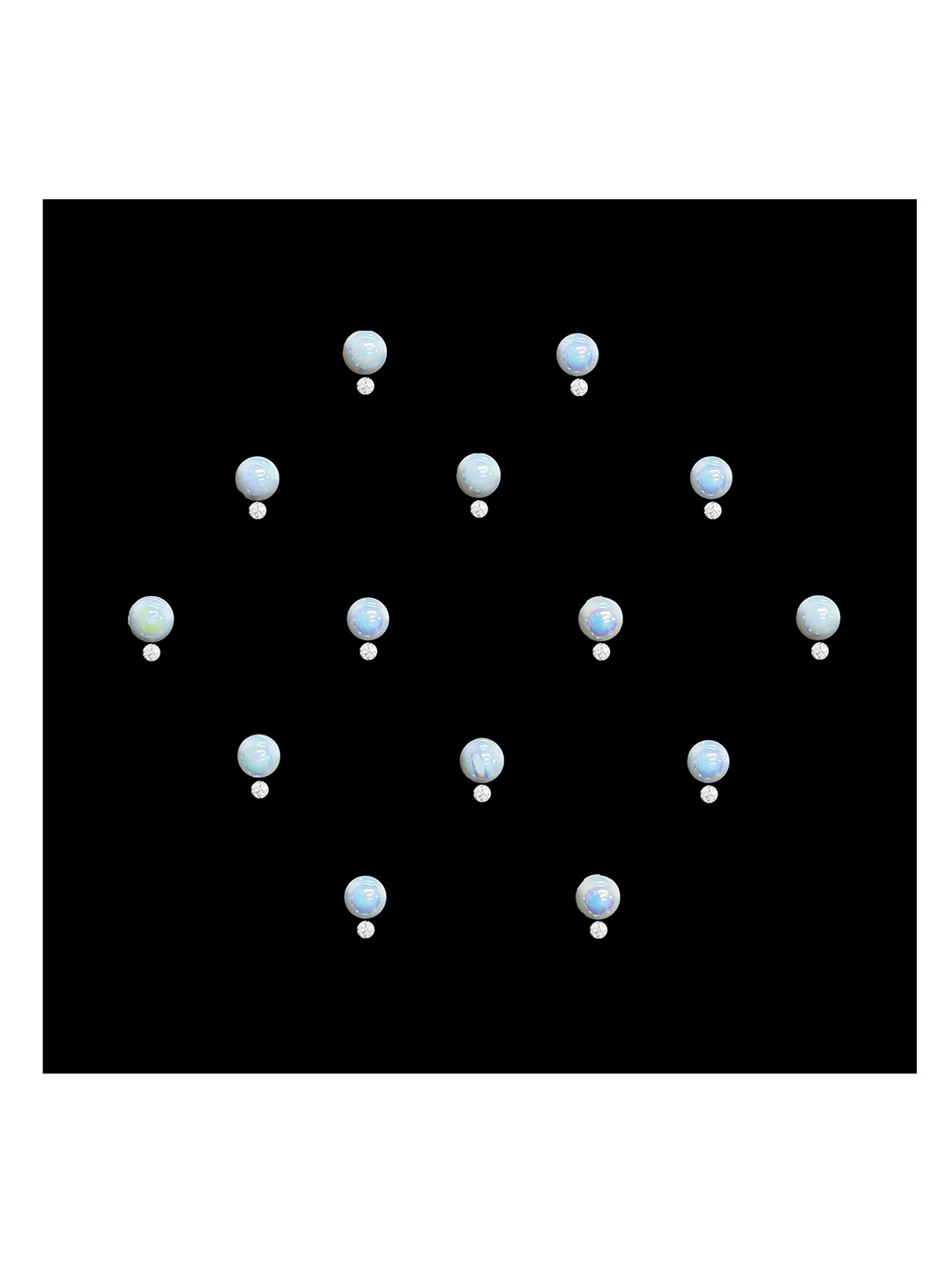 

Comet Busters 14-Pcs Handmade Traditional Designer Reusable Bindi - White 2117