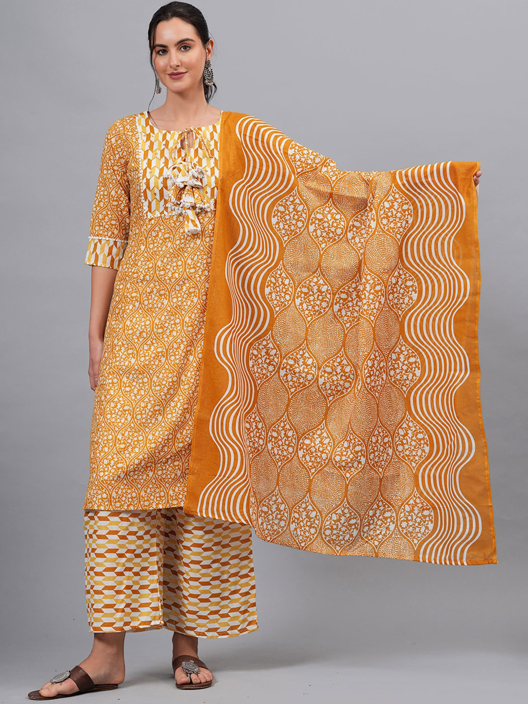 

KALINI Ethnic Motifs Embroidered Mirror Work Pure Cotton Kurta Set With Dupatta, Yellow