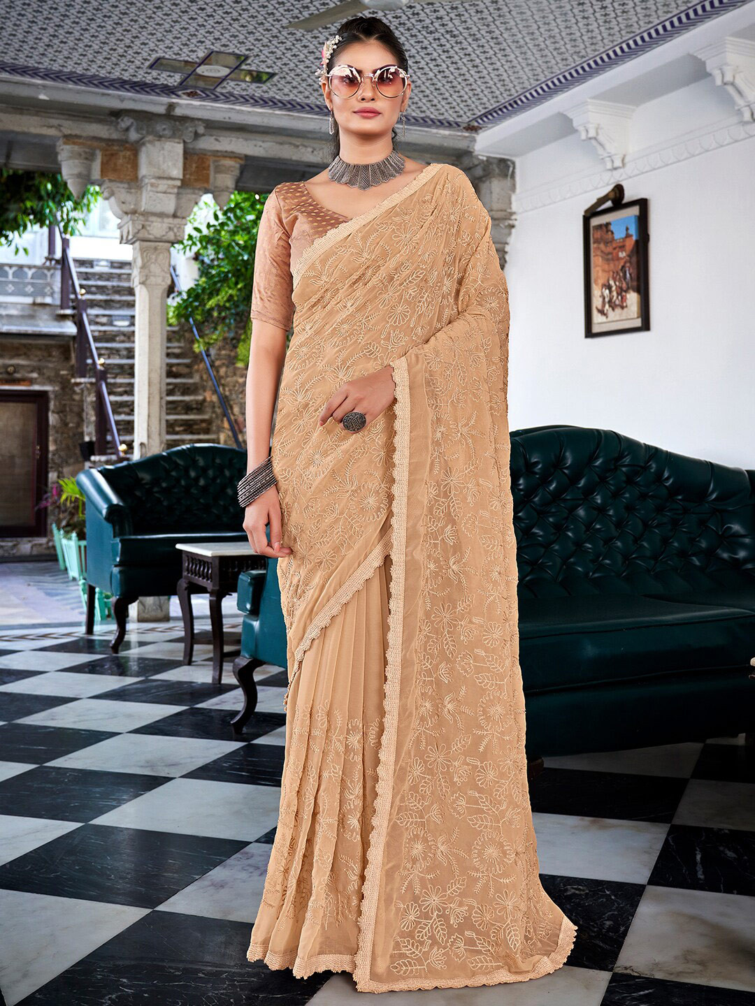 

Sunasi Ethnic Motifs Embroidered Pure Georgette Saree, Beige