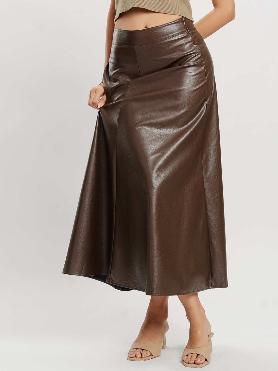 

FREAKINS Brown solid flared midi skirt with zip closure, and a flared hem