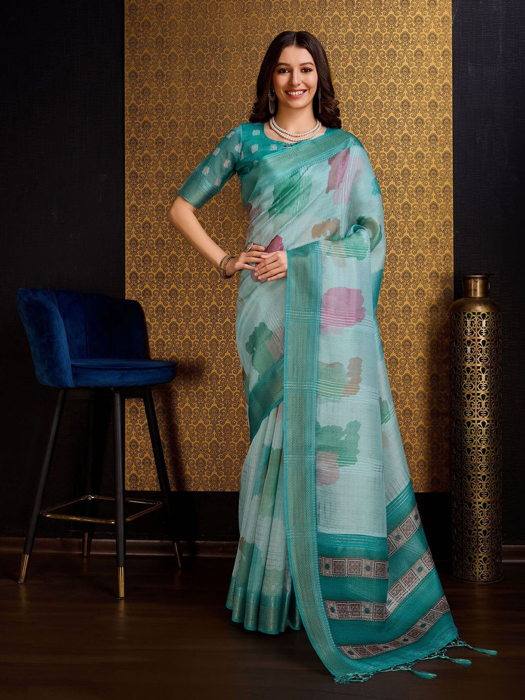 

Mitera Teal Blue Abstract Printed Woven Design Zari Organza Saree