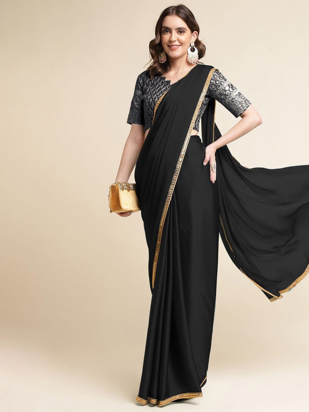 

Mitera Black Embroidered Pure Chiffon Saree