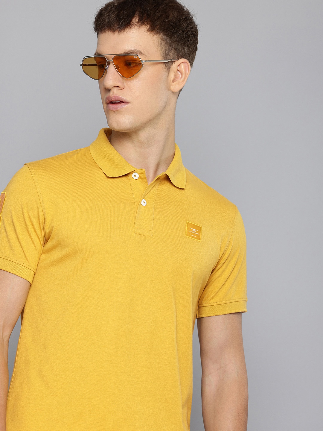 

Flying Machine Men Solid Polo Collar Cotton T-shirt, Mustard