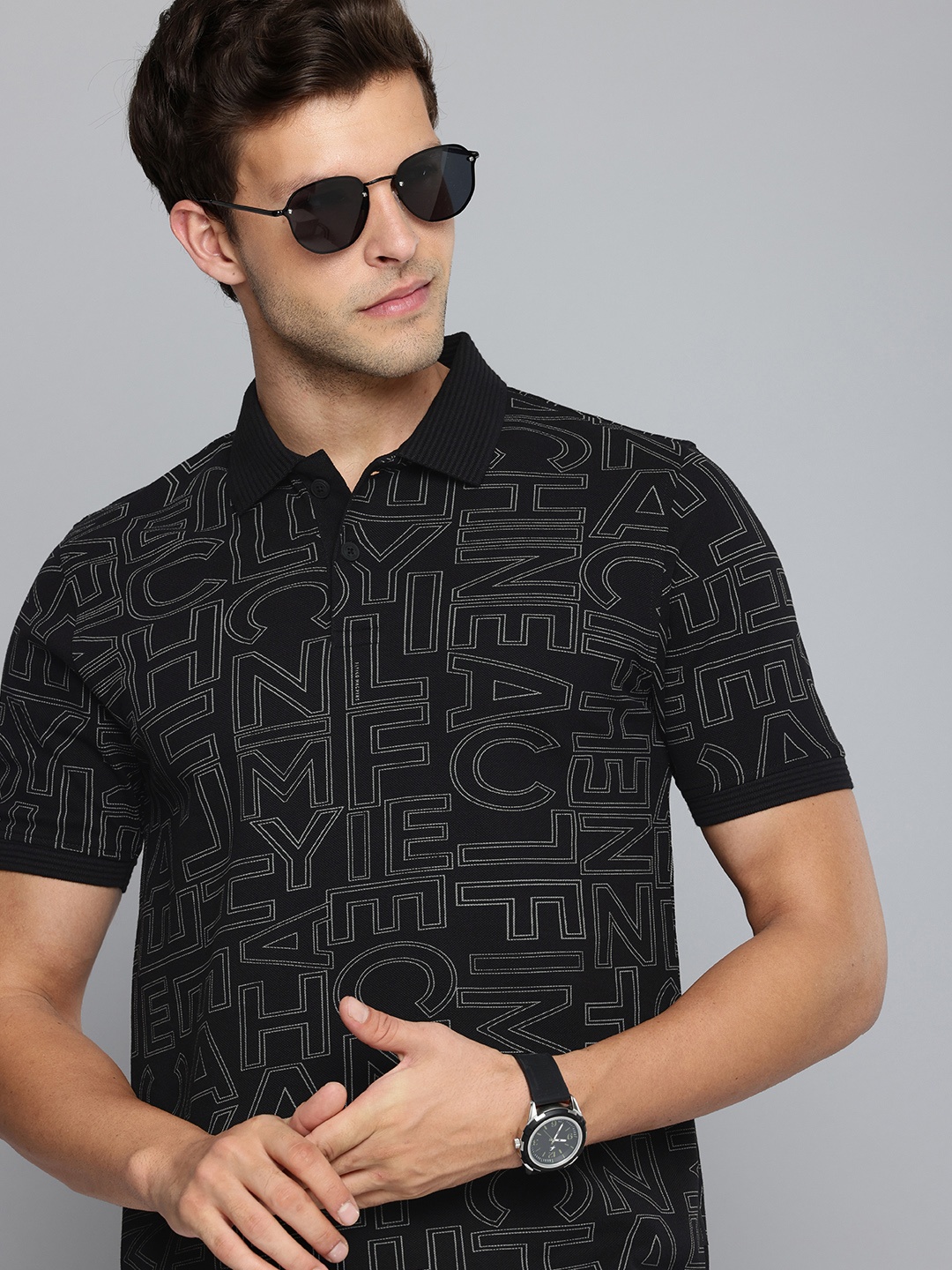 

Flying Machine Typography Printed Polo Collar Pure Cotton T-shirt, Black