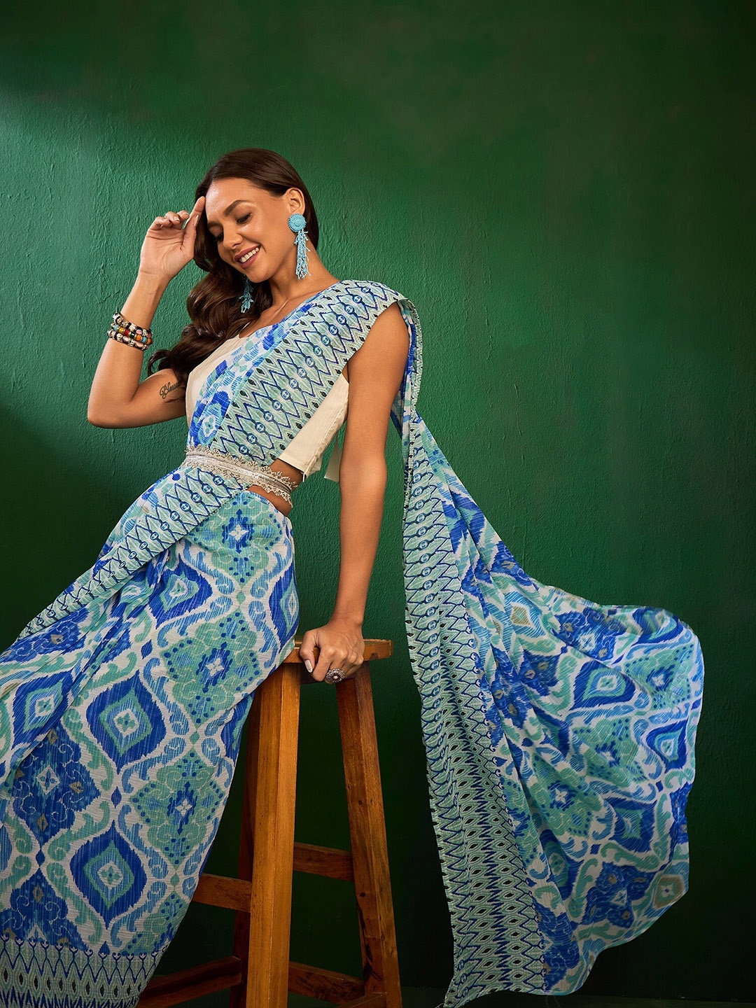 

Sangria Ikat Printed Saree With Embellished Belt, Blue