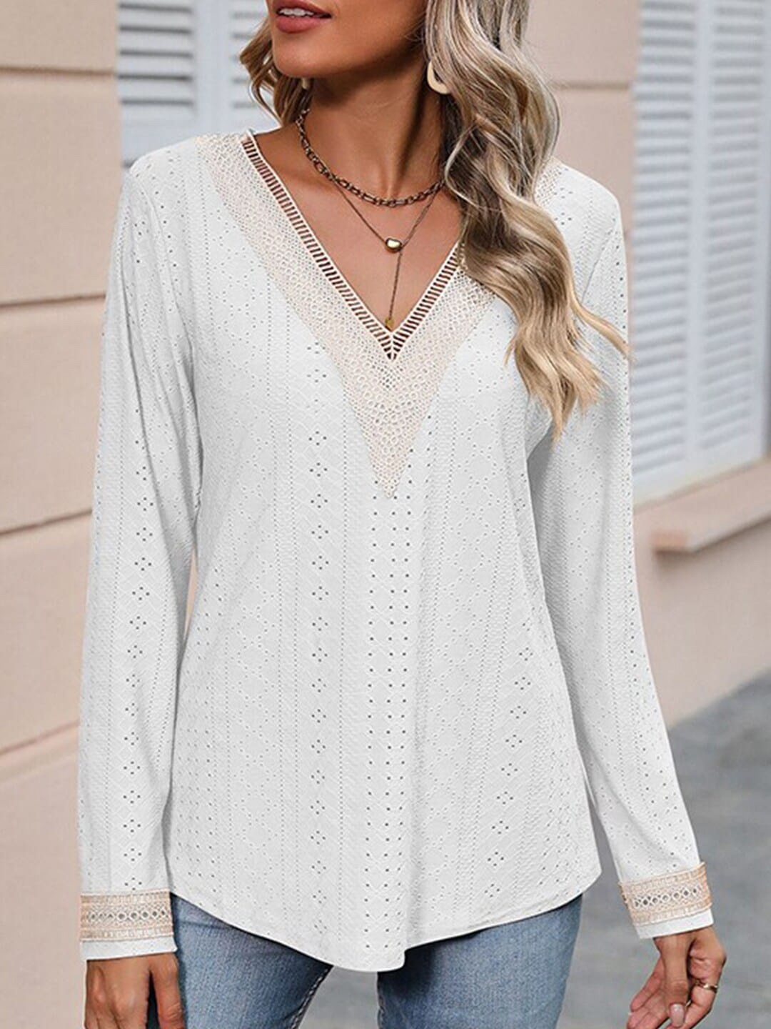 

StyleCast x Revolte White V-Neck Self Desigh Top