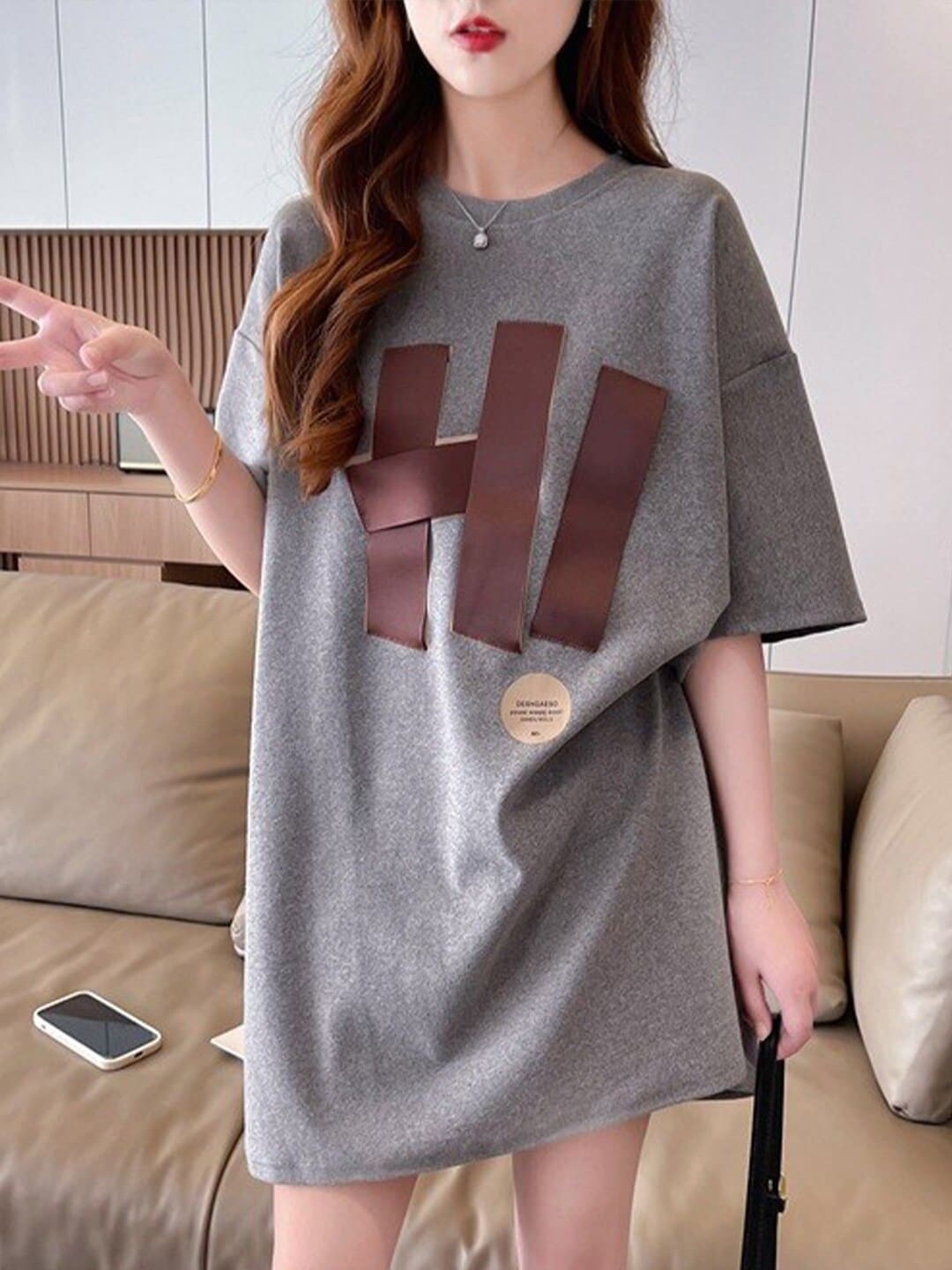 

StyleCast x Revolte Grey Print Extended Sleeves Cotton Top