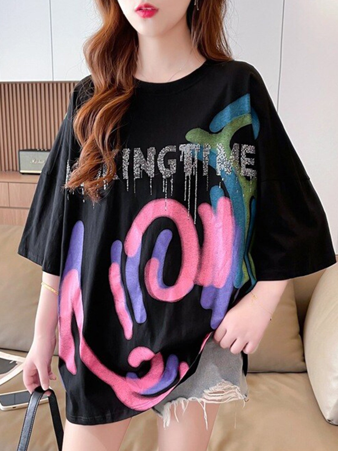 

StyleCast x Revolte Typography Printed Drop-Shoulder Oversized Longline Cotton T-shirt, Black