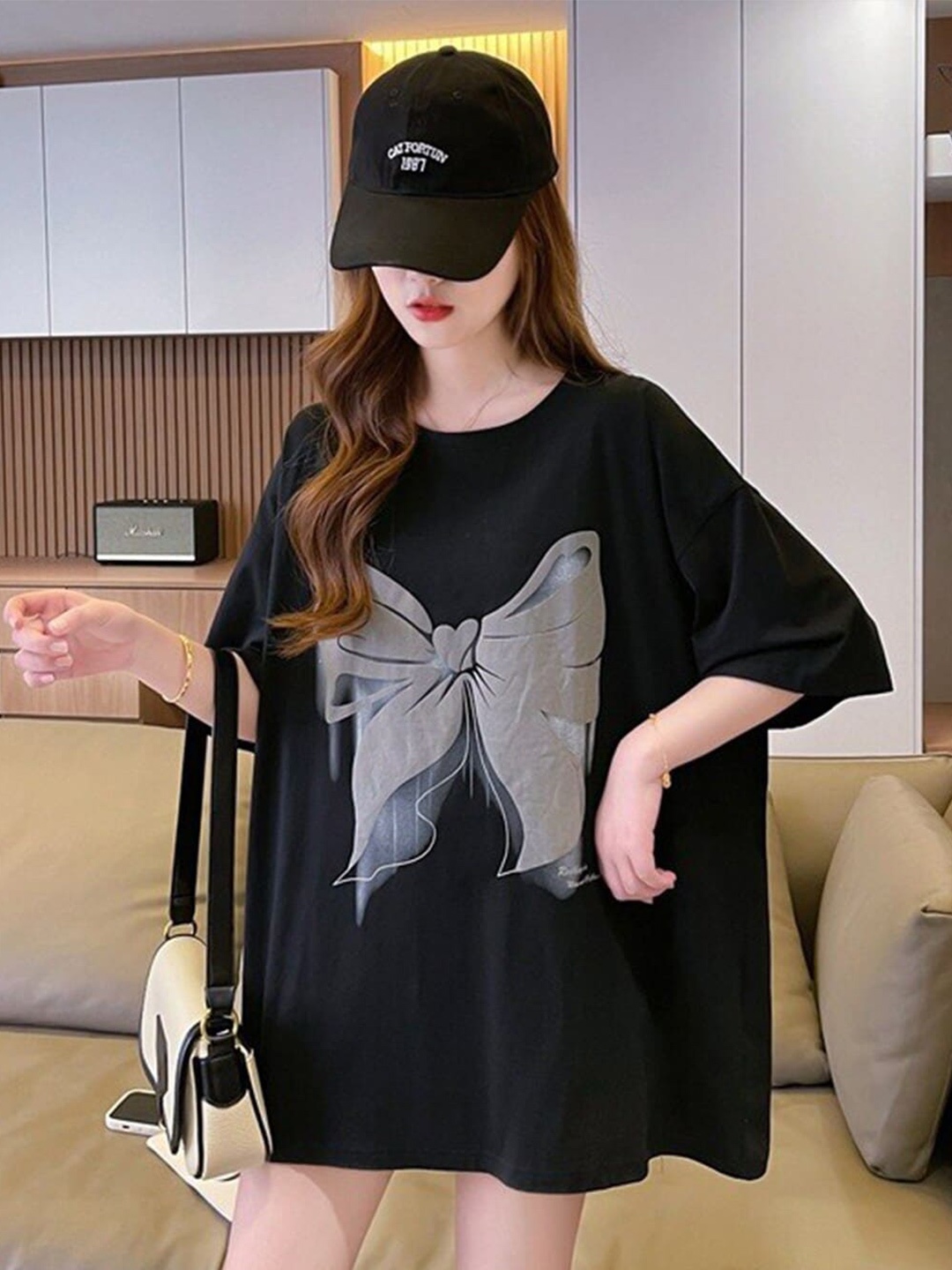 

StyleCast x Revolte Graphic Printed Drop-Shoulder Sleeves Cotton T-shirt, Black