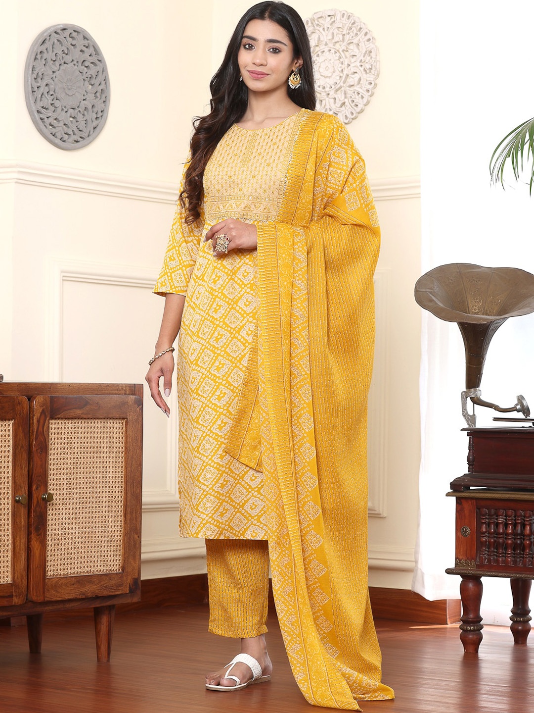 

Haute and Humble Ethnic Motifs Printed Regular Thread Work Kurta With Trousers & Dupatta, Mustard